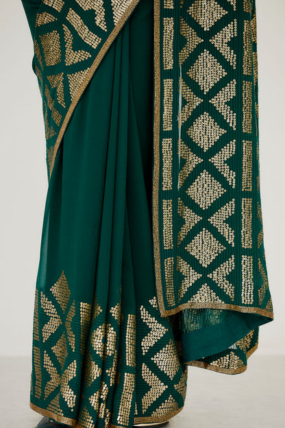 Sari Set with Ikkat inspired sequin embroidery.