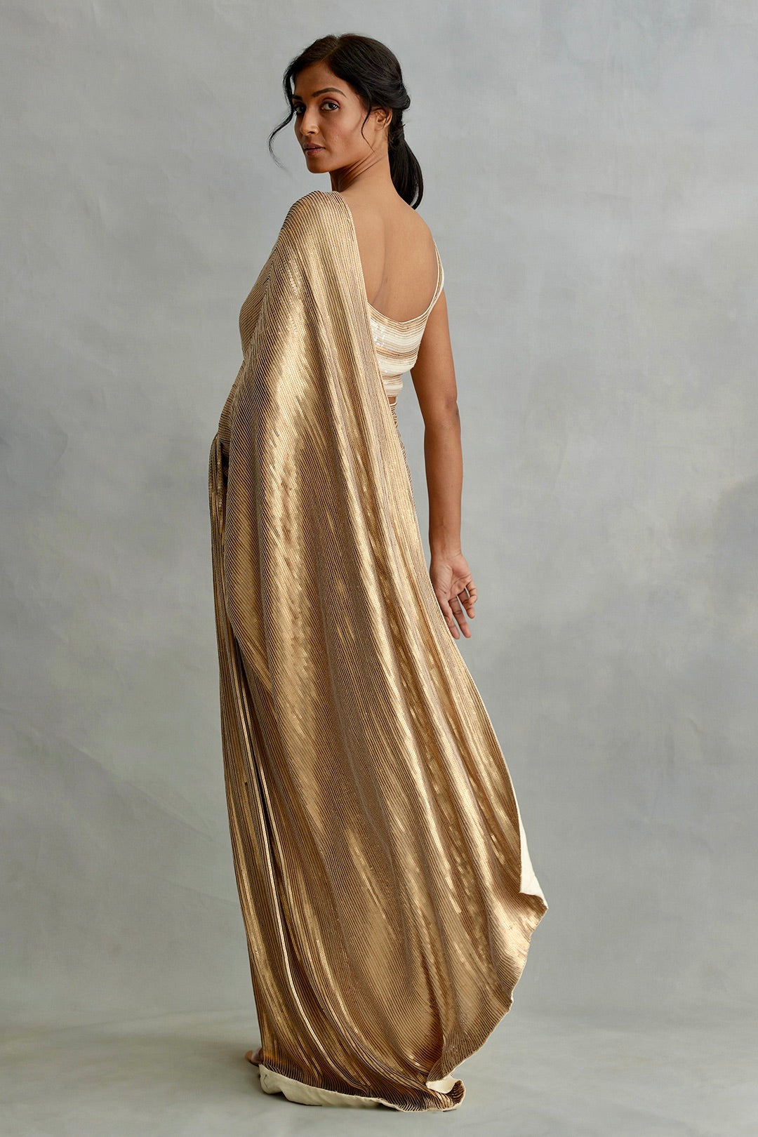 Sari in gold sequin sheeting embroidery